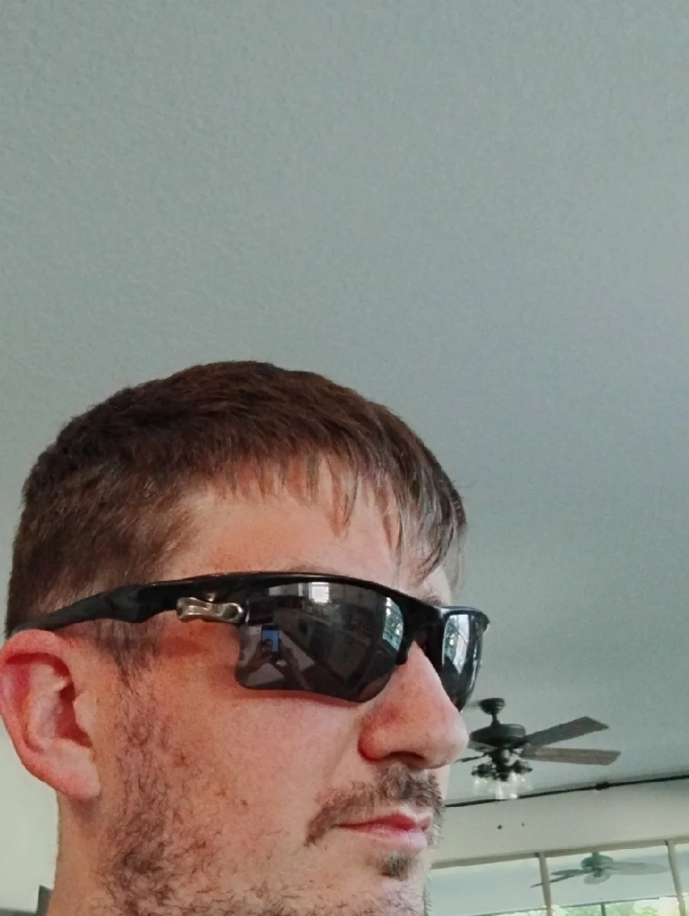 Oakley Black Frame Sunglasses with Gray And Orange Lenses